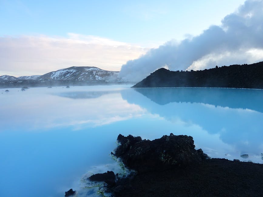 Blue Lagoon water with mountains in the background