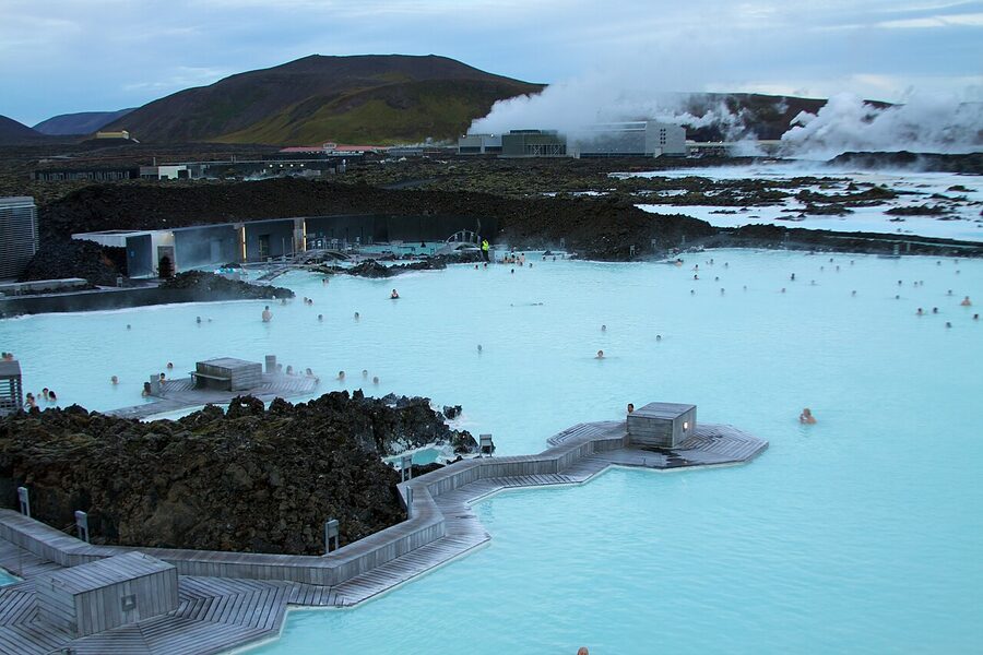 A visitor wearing a silica mud mask at the Blue Lagoon
