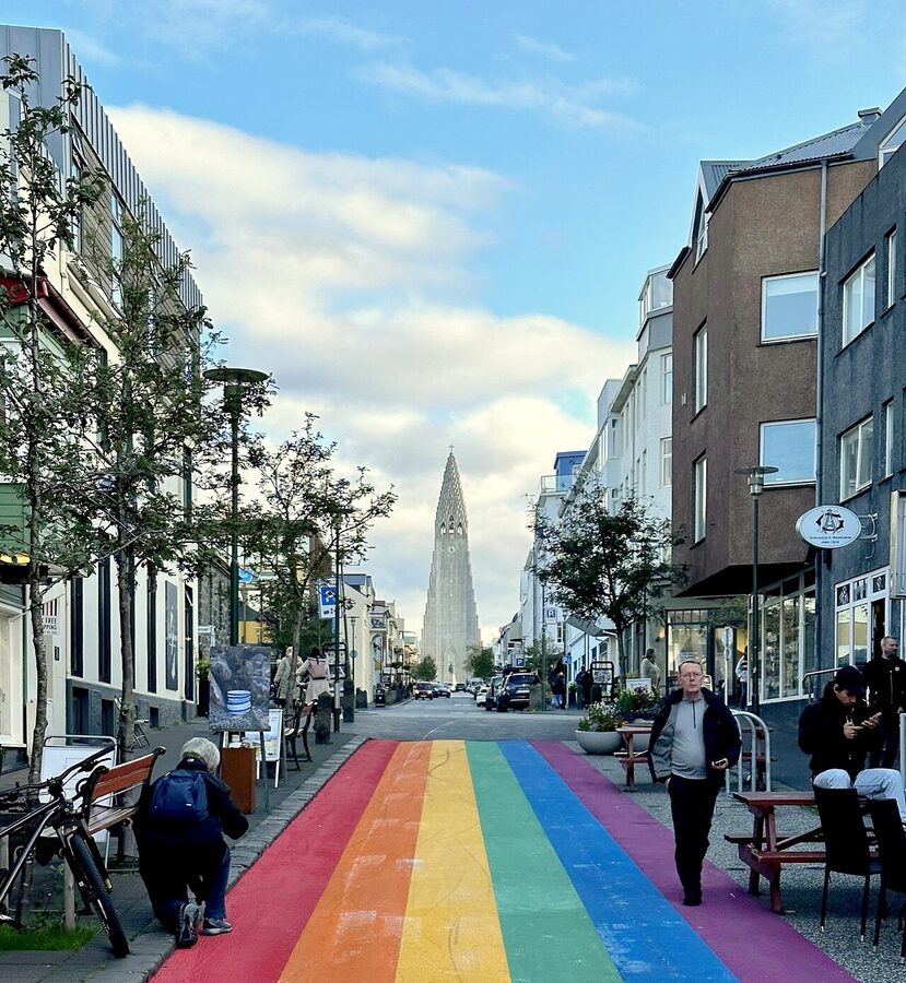 Rainbow-painted Skólavörðustígur street with Hallgrímskirkja behind