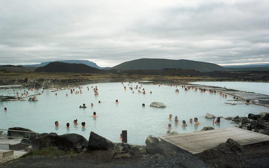 People relaxing at Sky Lagoon Reykjavik with infinity edge