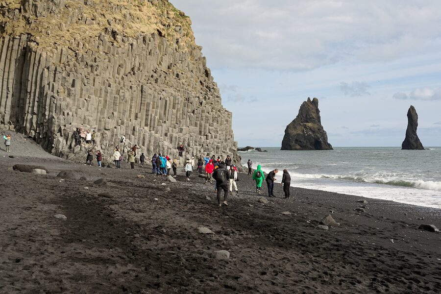 Basalt columns at Reynisfjara black sand beach with breaking waves