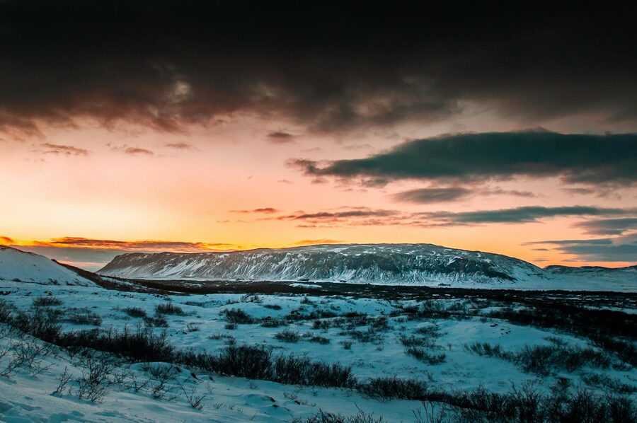 Sunset clouds over a snowy Icelandic landscape