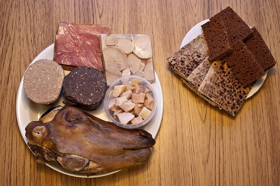 A traditional Icelandic food spread with fermented skate, hangikjöt, and flatbread