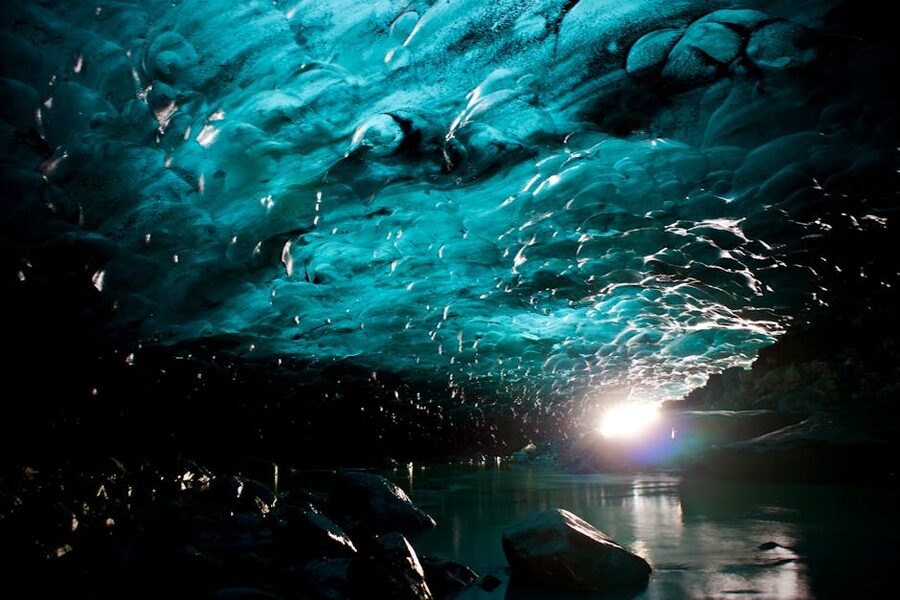 Blue ice cave inside a glacier in Iceland in winter
