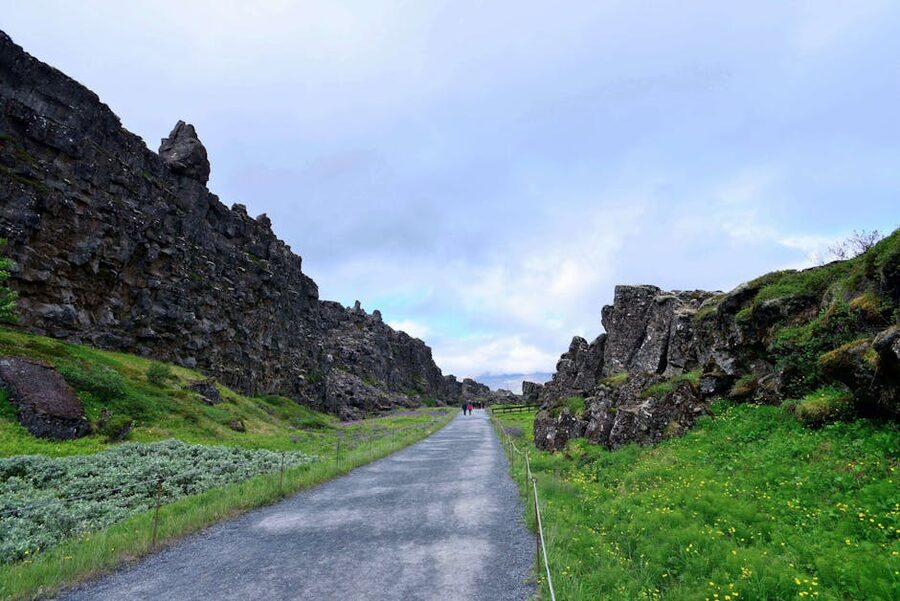 Pathway through the rift cliffs at Thingvellir Iceland in summer