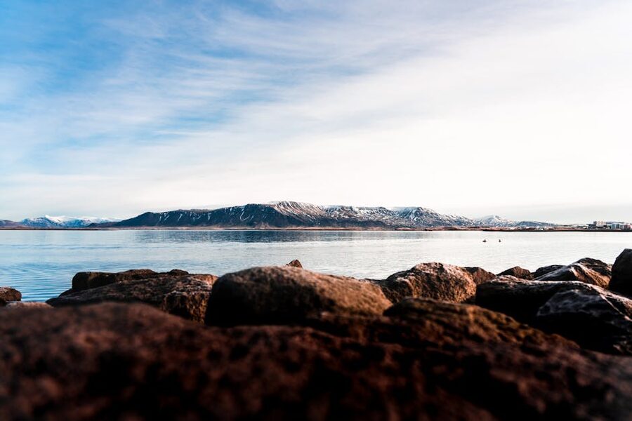 Snow-covered mountains and lake in Iceland