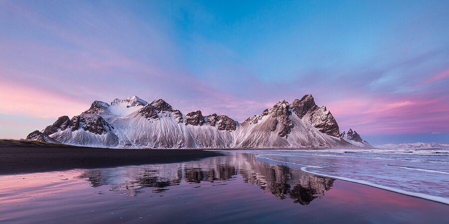 Stokksnes black sand beach at sunset with Vestrahorn in background