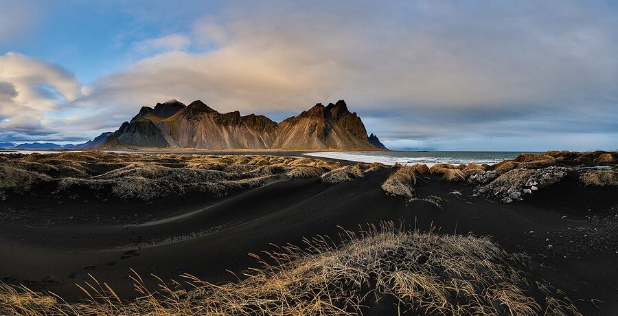 Vestrahorn mountain rising over Stokksnes black sand beach in East Iceland