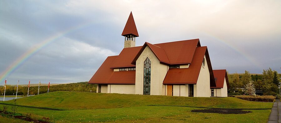 Rainbow over Snorrastofa cultural centre in Reykholt, west Iceland