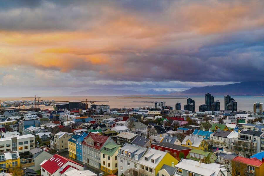 Reykjavik at dusk with city lights and the bay