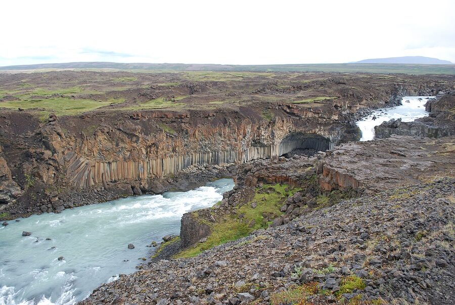 Aldeyjarfoss waterfall plunging over walls of columnar basalt in north Iceland