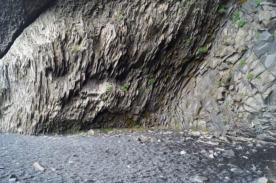 Hexagonal basalt columns at Reynisfjara black sand beach near Vik, Iceland