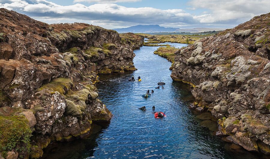 Crystal-clear glacial water in the Silfra fissure at Thingvellir, Iceland