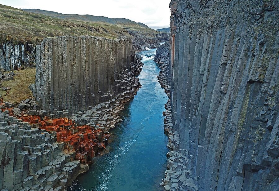 The basalt columns of Studlagil canyon in east Iceland, with turquoise river