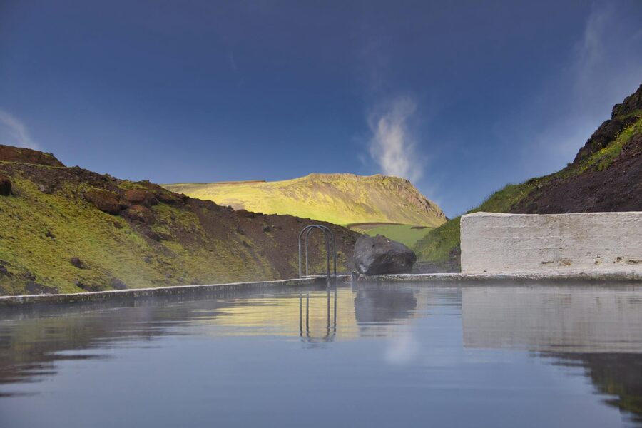 Geothermal infinity pool overlooking the ocean in Iceland