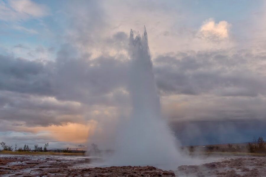 Strokkur pool forming dome before eruption