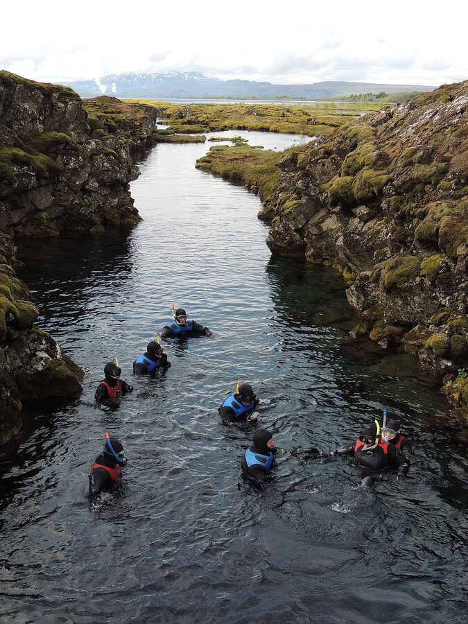 Snorkellers in the Silfra fissure at Thingvellir