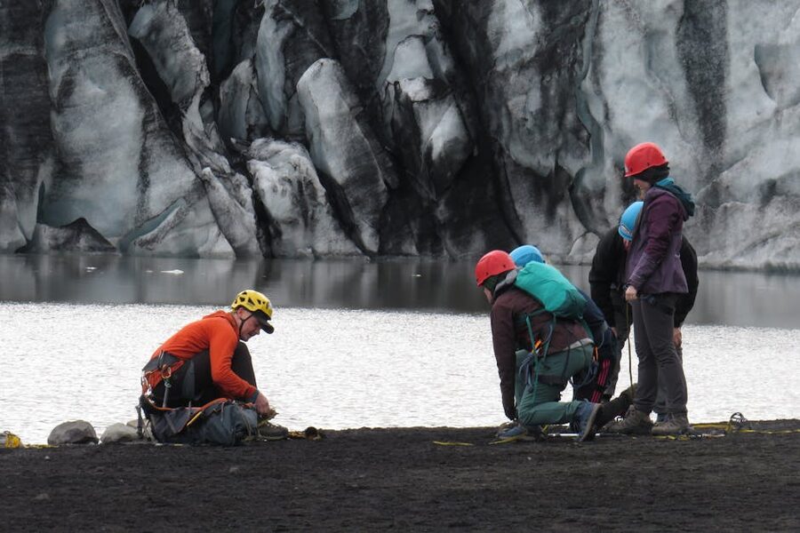 Climbers preparing for a glacier hike near Vik
