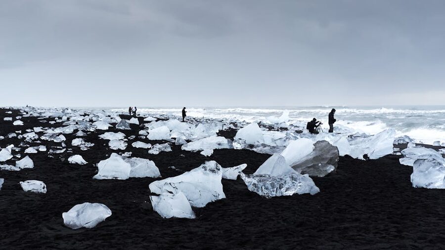 Iceberg fragments on the black sand of Diamond Beach Iceland