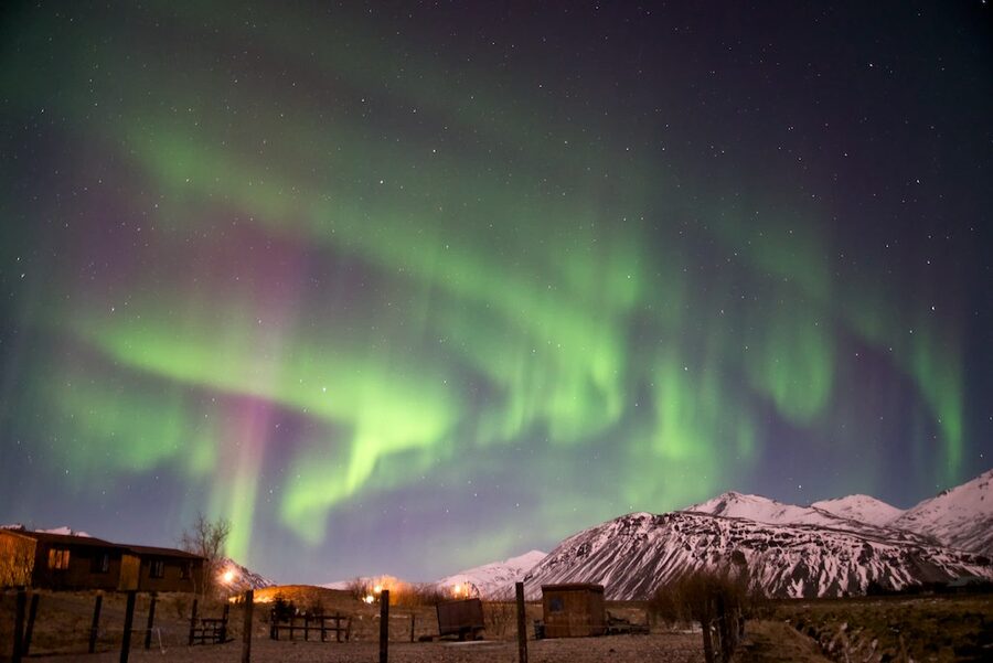 Aurora glow over the harbour at Höfn in southeast Iceland
