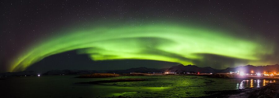 Wide panorama of aurora over the south coast near Höfn