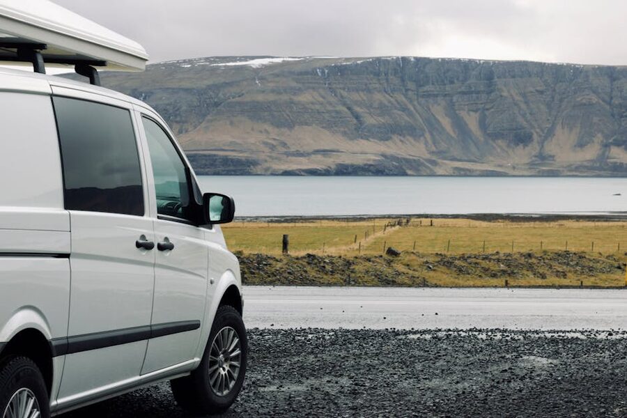 Campervan parked by an Icelandic lake