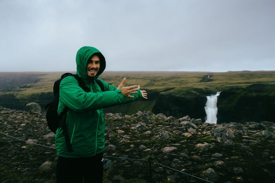Traveler near Haifoss waterfall in Iceland