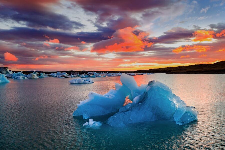 Icebergs in Jokulsarlon glacier lagoon at sunset, Iceland