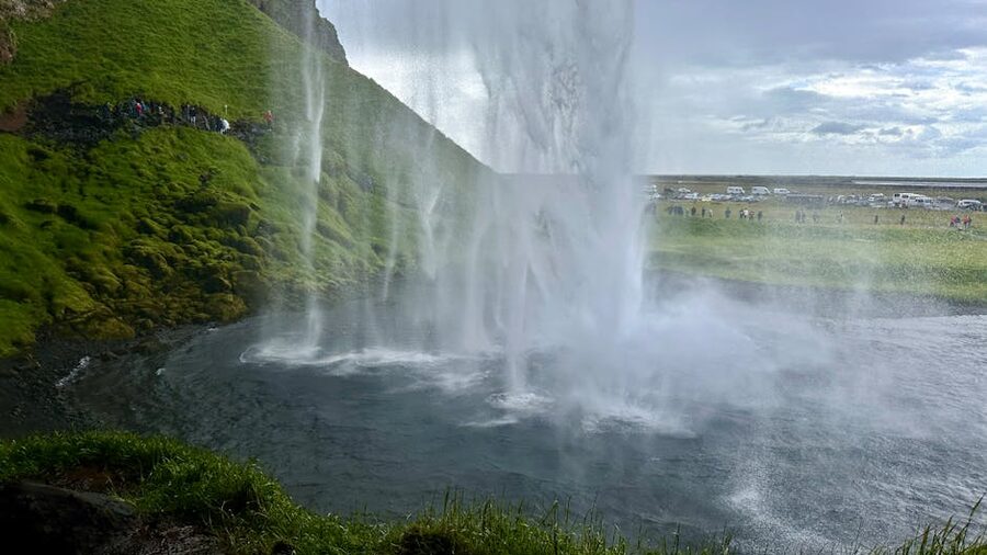 Seljalandsfoss waterfall in the south of Iceland with green cliffs