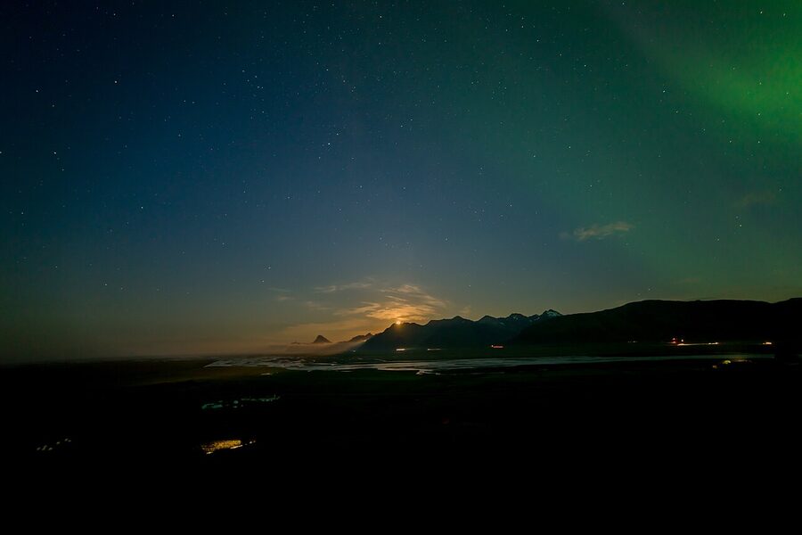 Northern lights aurora borealis over a clear sky in Iceland