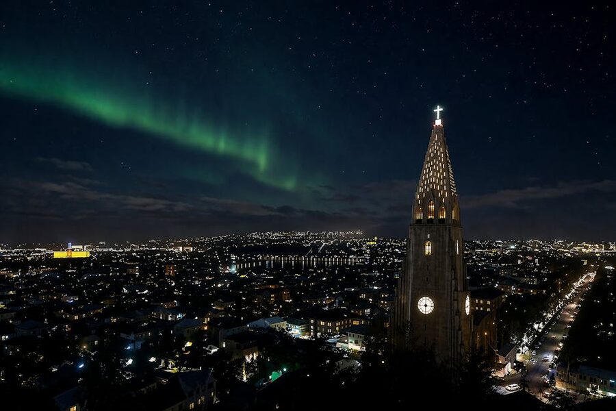 Northern lights aurora over Hallgrímskirkja church in Reykjavik