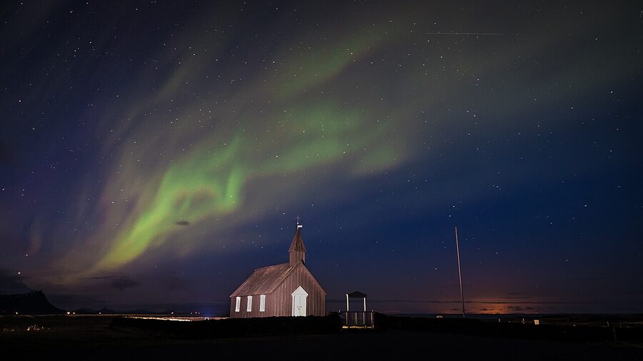Aurora over the black church Budakirkja at Budir on Snaefellsnes