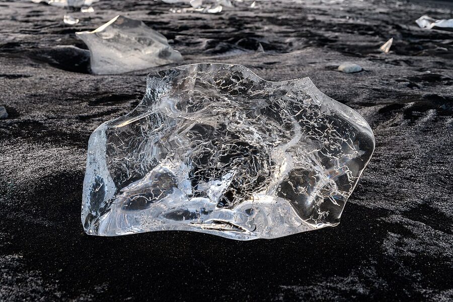 Glacial ice chunk on Diamond Beach black sand