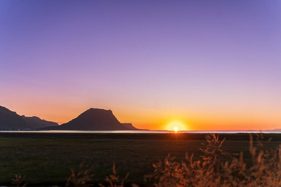Sunset over Grundarfjordur with mountain and purple sky in Iceland