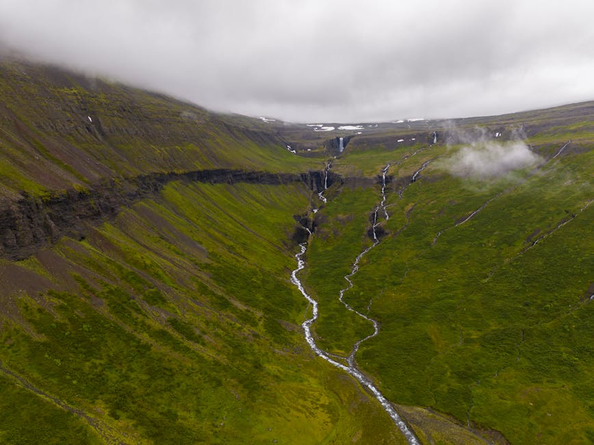 Hornstrandir fjord with green cliffs and quiet waters