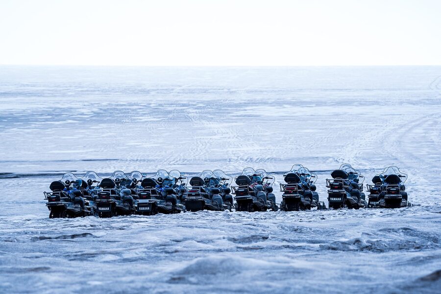 Snowmobile rider on Iceland glacier