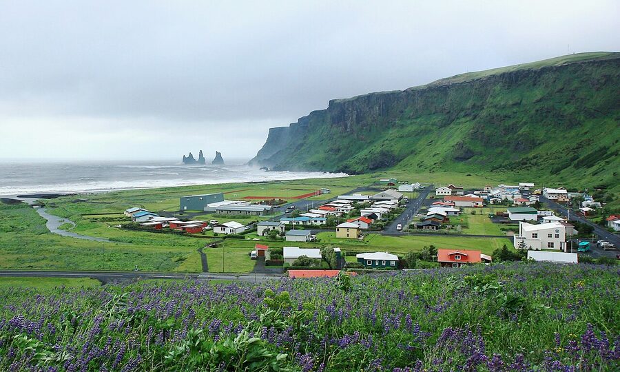 Vík í Mýrdal village in southern Iceland with church on hill