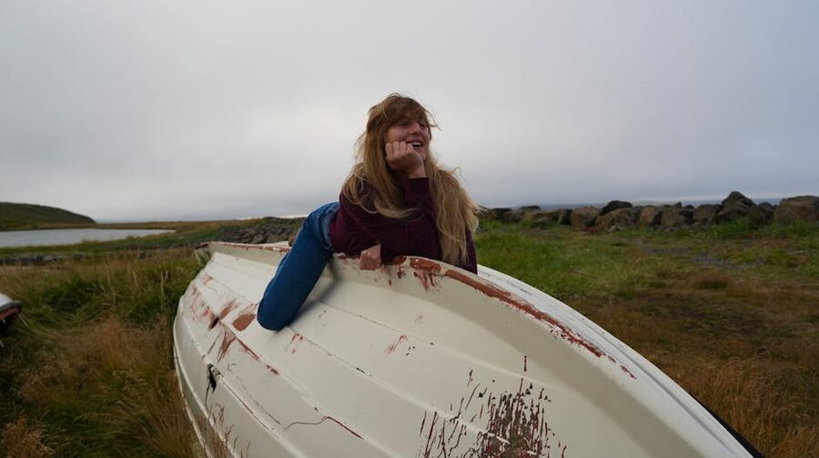 A traveler relaxes on a boat in Akureyri, north Iceland