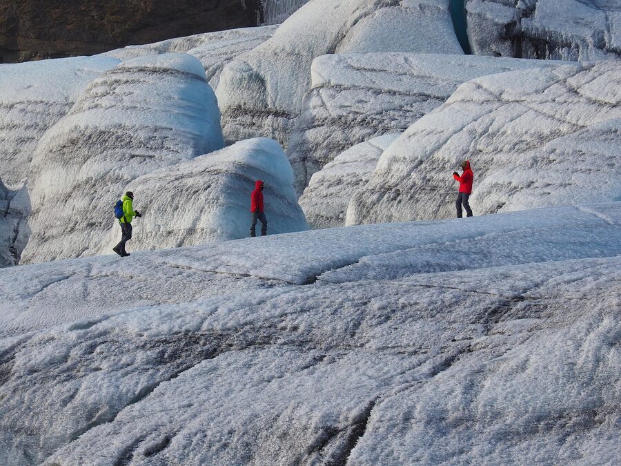 Glacier hiking with crampons on a guided tour Iceland