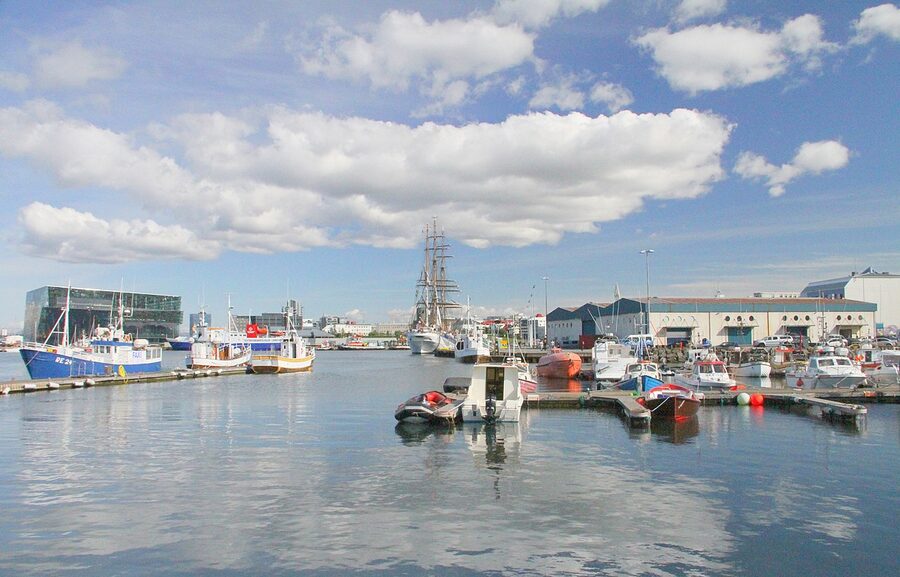 Reykjavik Old Harbour with whale watching boats moored at the dock