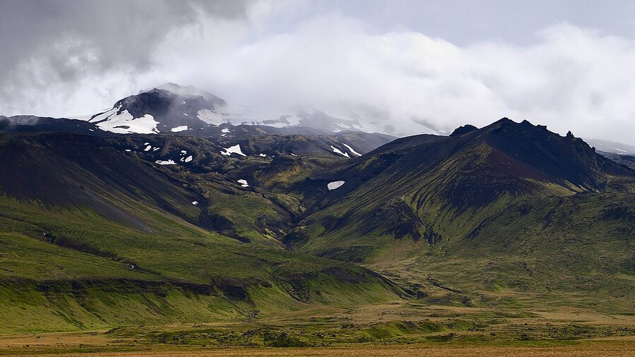 Snaefellsnes peninsula coastline Iceland with Snaefellsjokull glacier in distance