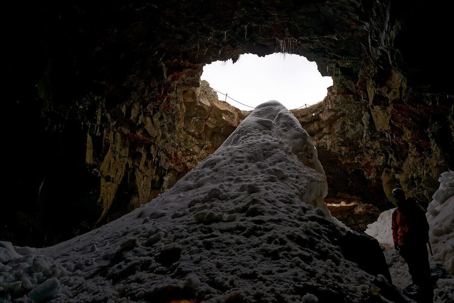 Coloured rock walls of the Raufarholshellir lava tunnel south of Reykjavik