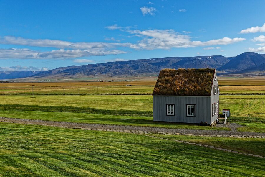 Empty stretch of Iceland Ring Road with mountains in the distance