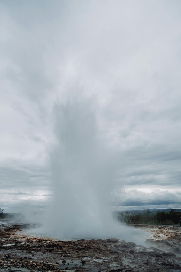 Strokkur geyser mid-eruption at the Geysir field on the Golden Circle