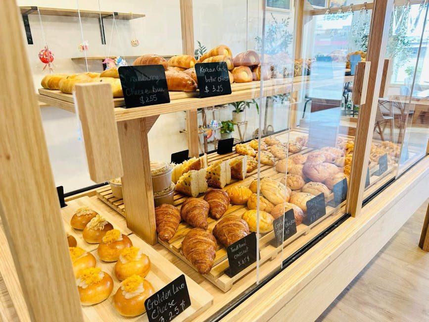 Assorted pastries and breads displayed in a cozy bakery