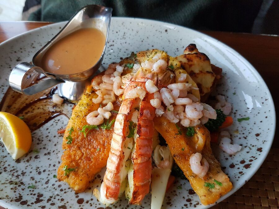 Salmon steak with garlic roasted shrimps and lobster at Café Duus in Keflavik