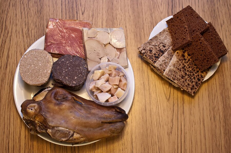A traditional Þorramatur platter with smoked lamb, blood pudding, hákarl, and other preserved Icelandic foods