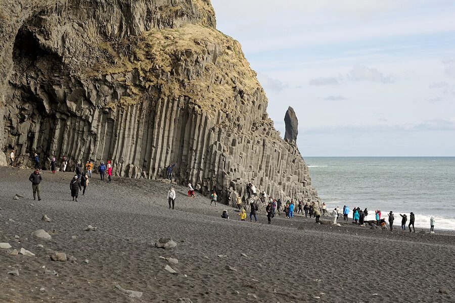 Reynisfjara black sand beach with basalt columns and the sea
