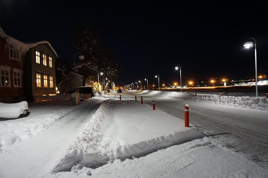Snowy night street in Akureyri, north Iceland