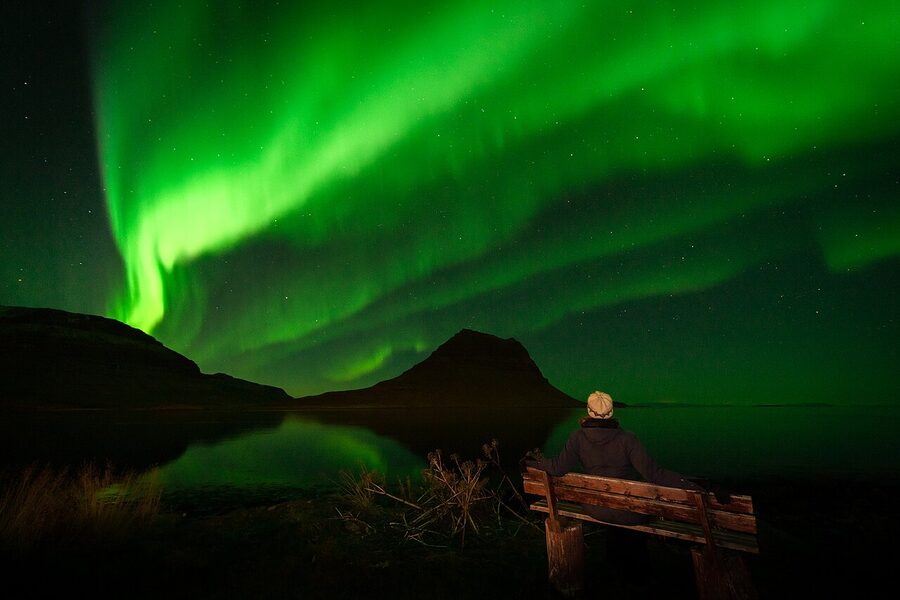 Northern lights over Kirkjufell mountain seen from Grundarfjörður